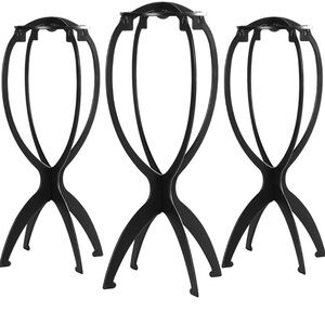 5 Brand new wig stands still in packages.